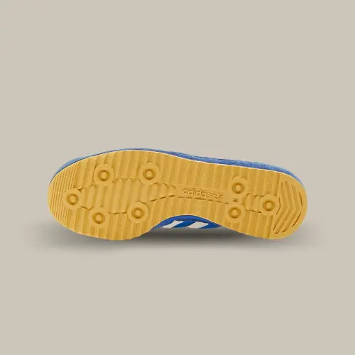 La semelle dentelée de la Adidas SL 72 RS Blue Scarlet en gomme de caoutchouc marron clair.
