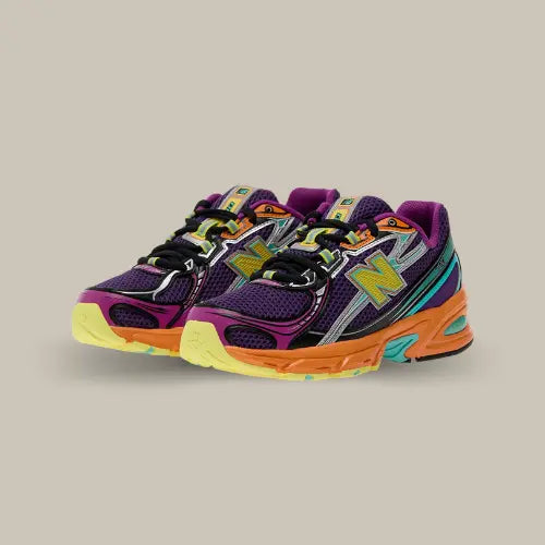 Paire de New Balance 740v2 Concord Grape Sun Glow – baskets running rétro en mesh violet avec détails orange, turquoise et jaune, semelle ABZORB, disponibles sur Offsneakz