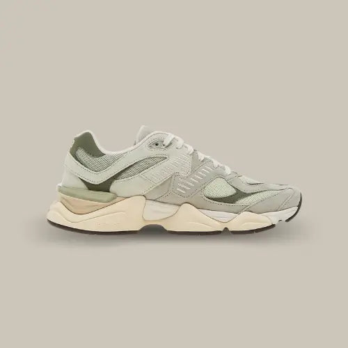 La New Balance 9060 Olivine vue de côté avec base composé de différent verts.