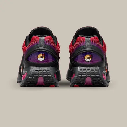 Le dos de la Nike Air Max DN All Day avec une semelle recourbée et le logo DN