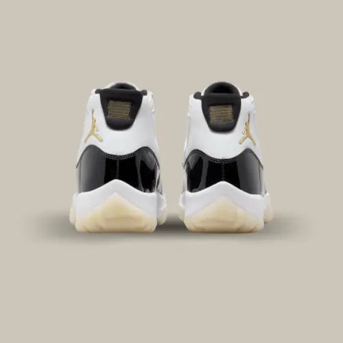L'arrière de la Air Jordan 11 Retro Gratitude avec son cuir blanc et son cuir en verni noir.