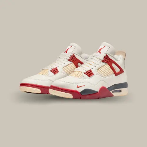 Paire Air Jordan 4 Nigel Sylvester Brick By Brick avec coloris blanc rouge et finitions premium - Offsneakz