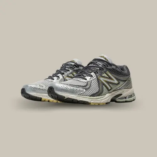 New Balance 860 V2 Earth en mesh gris métallisé avec détails kaki et semelle amortissante, disponible sur Offsneakz.