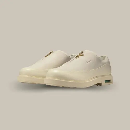 Nike Air Max RK61 Air Afrique Coconut Milk – sneaker avant-gardiste en cuir crème avec fermeture zippée et bulle Air visible, disponible sur Offsneakz.