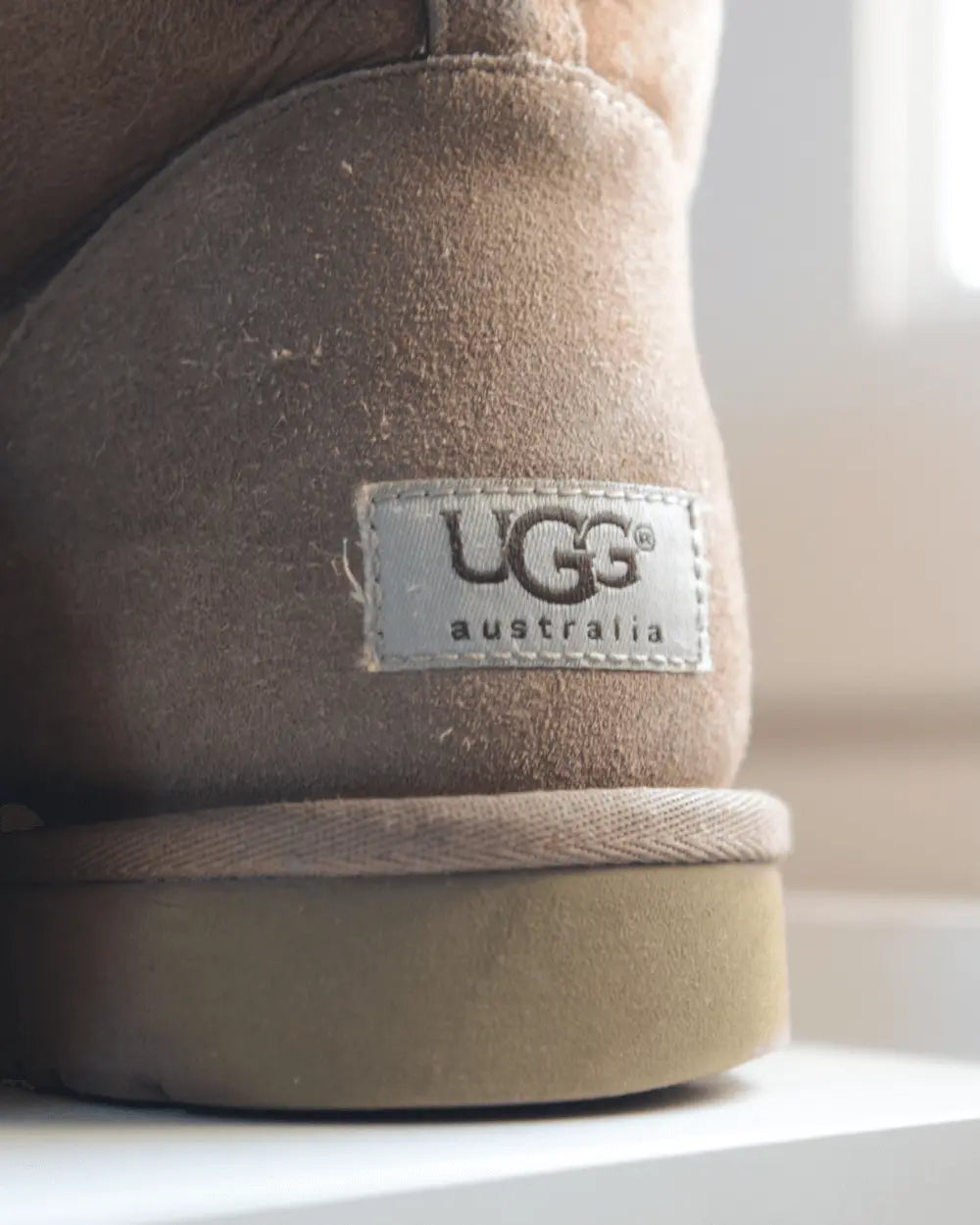 Dos d'une botte Ugg avec la marque UGG Australia